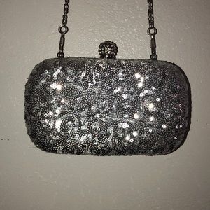 Silver sequin clutch with chain